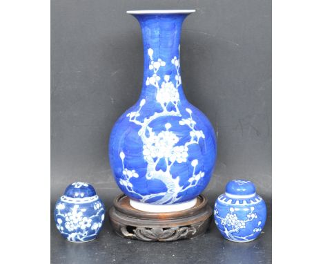 A collection of vintage 20th century Chinese Oriental blue and white prunus porcelain china comprising of a vase on pierced s