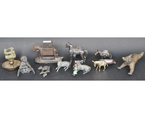 A collection of vintage 20th century metal animal figurines comprising of a donkey match striker, donkey table lighter, horse