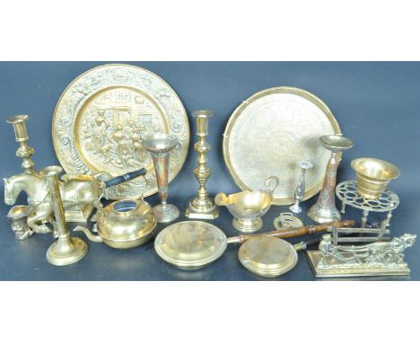 A large collection of vintage 20th century brass items comprising of trays, bedwarmers, candle sticks, bowls, horse brasses a