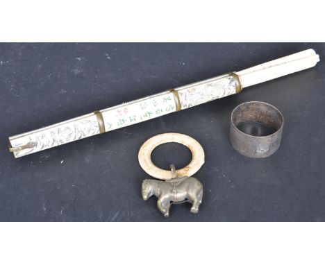 A 19th century silver and bone babies rattle with EPNS marked donkey. Together with a silver hallmarked napkin ring and a&nbs