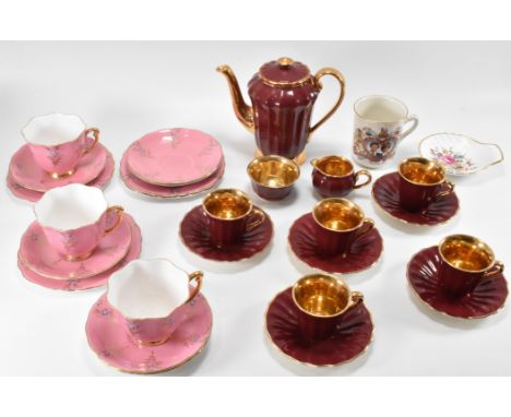 A vintage 20th century Wade porcelain tea / coffee service in red ground with gilt bordering.&nbsp; The service comprising te