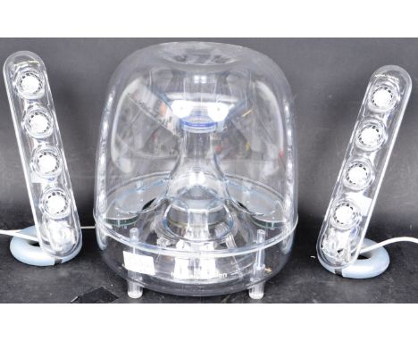 A contemporary Harman Kardon SoundSticks II home audio Hi-Fi Sound system speaker set. Frequency range 44Hz-20kHz. Power cons