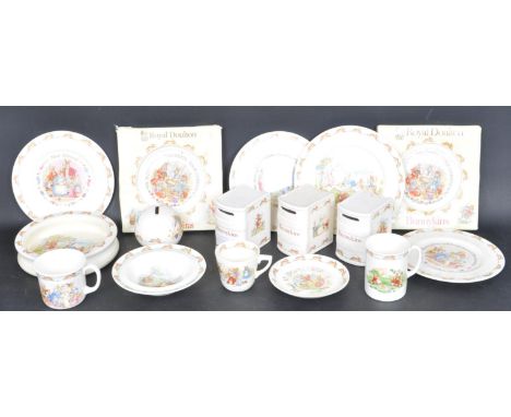 A collection of vintage 20th century Royal Doulton Bunnykins china to include four money banks, plates, bowls and mugs / teac