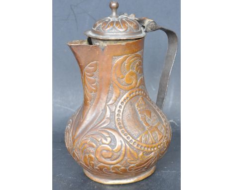 An unusual antique 19th Century continental sparrow beak copper milk creamer jug having Persian influence decoration with scr