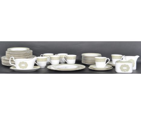 A Royal Doulton Sonnet pattern dinner service H5012 comprising of cups, saucers, plates, dinner plates, gravy boat and many m