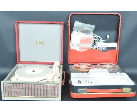 A retro vintage mid 20th century circa 1960s portable Emisonic turntable record player having a cream interior set within a r