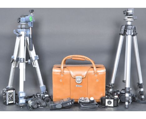 A large collection of vintage 20th century camera and photographic equipment to include a Kodak Duafflex II box camera, a Nik