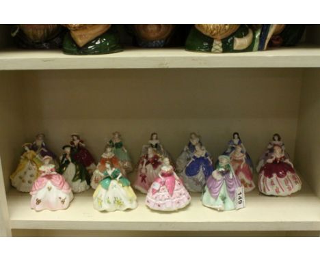 18 Coalport Fairest Flowers ceramic figurines