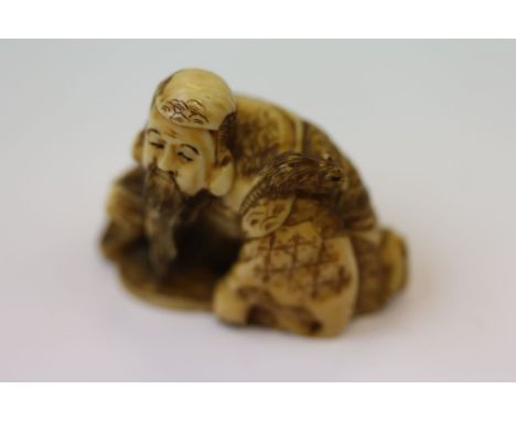 Meiji period Oriental carved Ivory netsuke of a bearded man