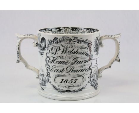 19th Century ceramic two handled Loving cup, marked "P Welshman Home Farm East Penard 1857 - a Present from James Culliford"