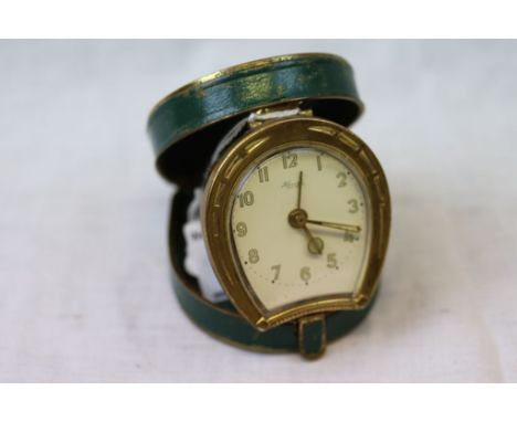 Vintage Kienzle Travelling Alarm Clock set in a Horseshoe Shaped Framed and Green Case