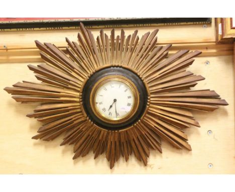 French key wind Sunburst wall clock with Gilt wood finish, domed glass and Enamel dial