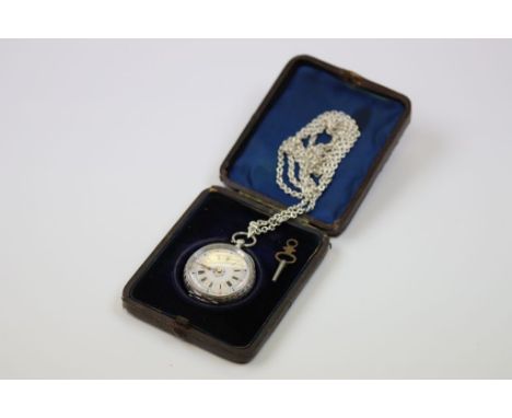 Swiss silver fob watch, white enamel dial with black Roman numerals within gilt circles, gilt poker hands, hand painted flora