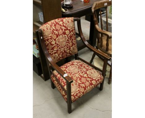 A 1930's oak fireside chair