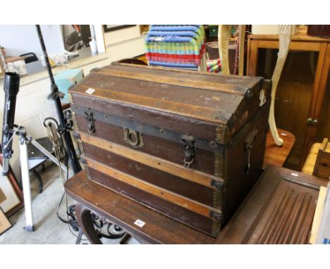 Victorian Wooden Bound and Canvas Domed Top Travelling Trunk, label to the inside ' J Biffen, Albany Street, London, establis