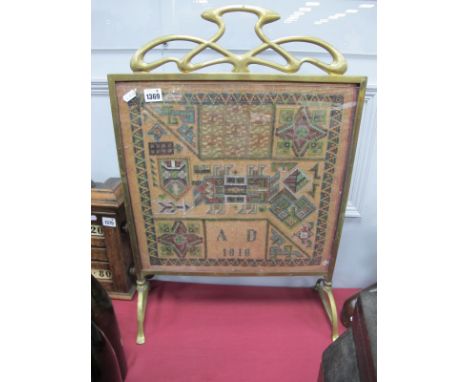 An Art Nouveau Brass Framed Fire screen, with bead work panel, dated A.D 1910, 46.5cm wide.