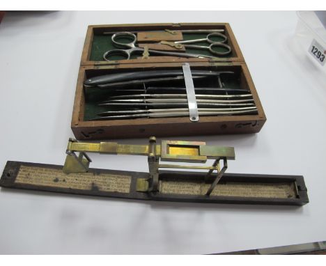 A Late XIX Century Surgeons Set, in a fitted mahogany case and a Wilkinson (Ormskirk) sovereign scales folding into a wooden 