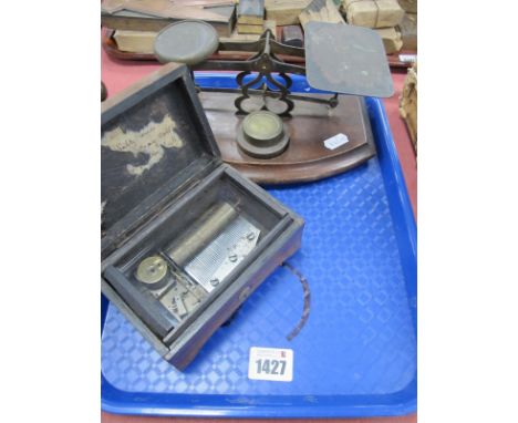 A Musical Box, with winder under base, '293' stamped to movement by cylinder 13.5cm wide, post office scales.