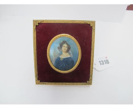 A German Mid XX Century Portrait Miniature, of Anna Kaula wearing a blue dress beside a pillar, in a yellow and gilt frame, 6