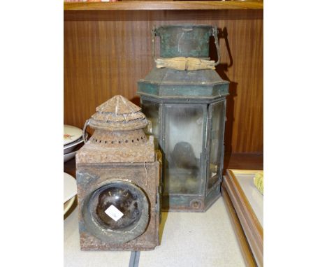 A copper masthead lamp, 40cm high and another lamp by Stevens &amp; Sons, Darlington Works, 27cm high, (a/f), (2). 