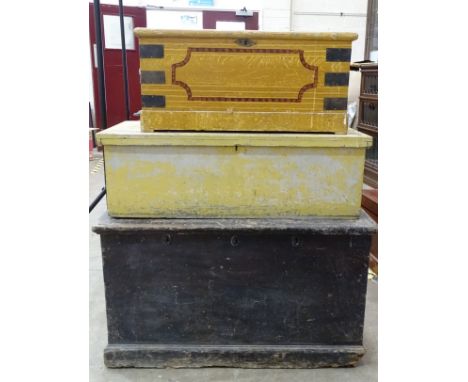 A stained pine tool chest, 100 x 56cm, 57cm high, (bottom af) and two smaller painted chests, (af), (3). 