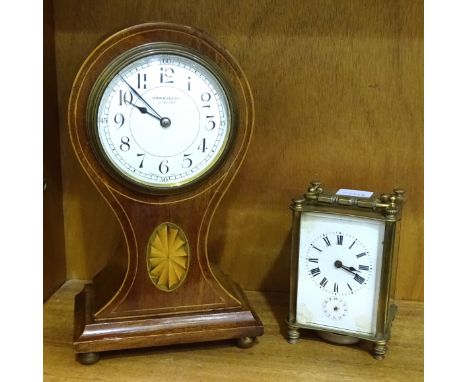 An early-20th century French-made inlaid mahogany balloon-shaped mantel timepiece, the dial marked Ham &amp; Huddy, Liskeard,