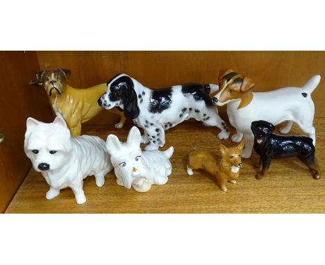 Four Beswick models:&nbsp;Dog with ladybird on nose, Corgi -&nbsp;small, Rottweiler&nbsp; - standing,&nbsp;West Highland Terr