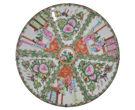 A large early 20th century Canton famille rose ceramic charger. The circular charger decorated with birds and flowers in the 
