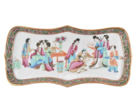A Qing dynasty Canton famille rose ceramic tray. The finely painted tray has a lobed shape, foliage border and a scene of a f