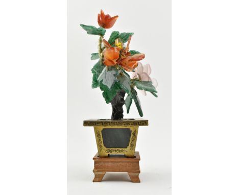 A 20th century jade and stone bonsai tree with pot. The tree decorated with colourful stone leaves and flowers with a jade an