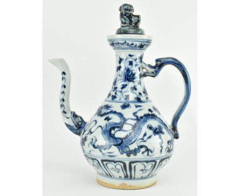 A Ming style blue and white ceramic lidded "Dragon" ewer. The globular body decorated with a three-claws dragon and clouds, w