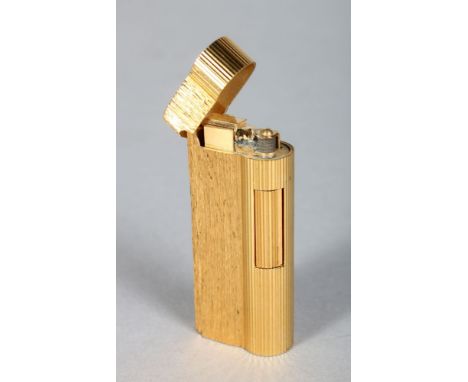 A DUNHILL GOLD COLOURED LIGHTER, No. 070624.