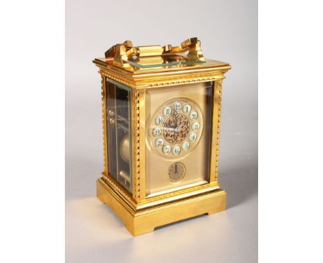 A GOOD FRENCH CARRIAGE CLOCK with repeat and alarm, Retailed by CAMERDEN & FORSTER, NEW YORK. 6.5ins high.