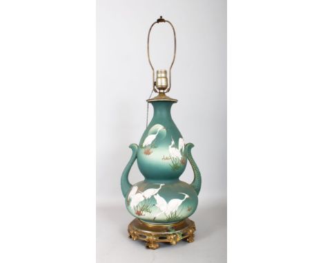 A CHINESE PORCELAIN BLUE STORK VASE, converted to a lamp. 2ft 3ins high.