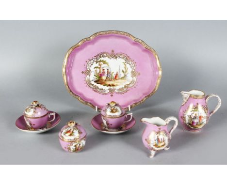 A GOOD MEISSEN CABARET, comprising oval shaped tray, two jugs, sucrier and cover, two cups, covers and saucers.  Mark in blue