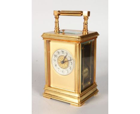 A GOOD 19TH CENTURY FRENCH BRASS REPEATER CARRIAGE CLOCK with silvered dial. 5.5ins high.