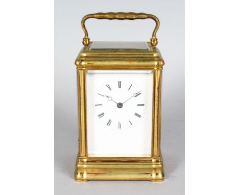 A 19TH CENTURY FRENCH BRASS CARRIAGE CLOCK with bell. 5.75ins high.