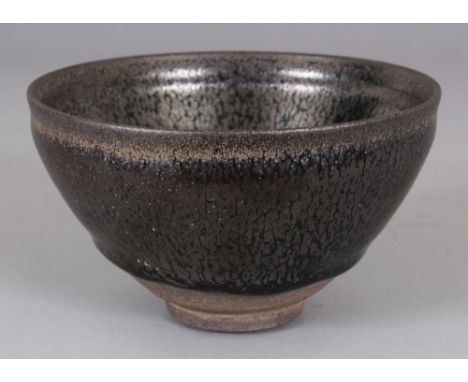 A CHINESE SONG STYLE JIAN WARE OIL SPOT GLAZED CERAMIC TEA BOWL, the glaze falling well short of the foot, 5.1in diameter & 3