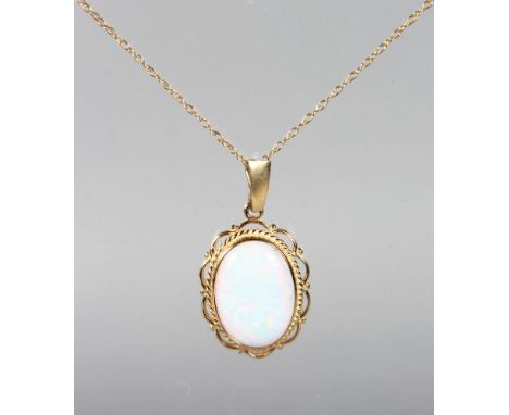 A 9CT YELLOW GOLD GILSON OPAL PENDANT AND CHAIN.