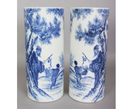 A MIRROR PAIR OF CHINESE REPUBLIC STYLE BLUE & WHITE PORCELAIN HAT STANDS, each decorated with calligraphy and with a sage an