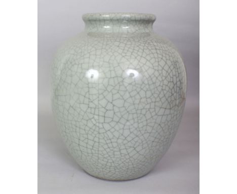 A LARGE CHINESE GE STYLE CELADON CRACKLEGLAZE PORCELAIN JAR, the base with a Qianlong seal mark, 10.5in wide at widest point 