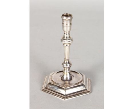 A GEORGE I TAPER STICK, with a hexagonal shape base. Maker: Joseph Bird.  London 1721.  4.5ins high.