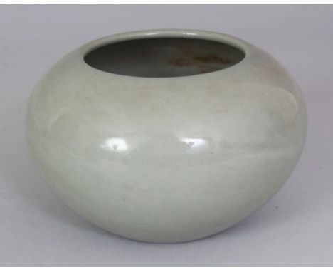 A CHINESE CELADON GLAZED PORCELAIN BRUSHWASHER, the base with a Qianlong seal mark, 4.75in wide at widest point & 3in high.