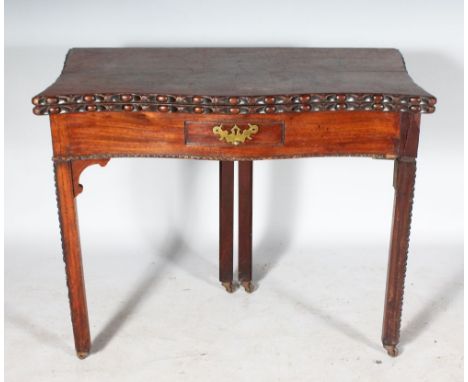 A CHINESE CHIPPENDALE DESIGN MAHOGANY TEA TABLE, with folding top, carved edge, single drawer on carved chamfered legs. 3ft w