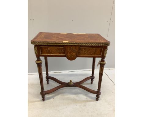 A Louis XVI style gilt metal mounted and marquetry inlaid folding card table, width 77cm, depth 40cm, height 78cm