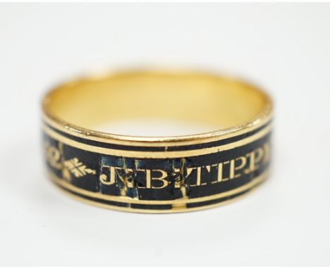 A George III yellow metal and black enamel set mourning band, inscribed ' J.B. Tippetts ob.28 June, 1782, ae.52', size P, gro
