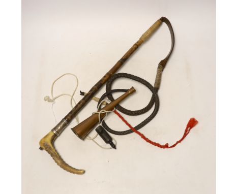 A silver mounted riding crop, a hunting horn and a horn whistle