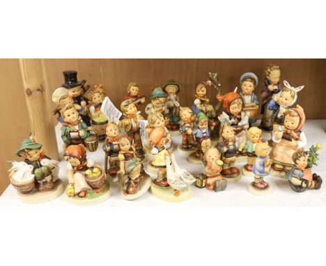 Twenty eight Goebel Hummel figures, largest 15cm high