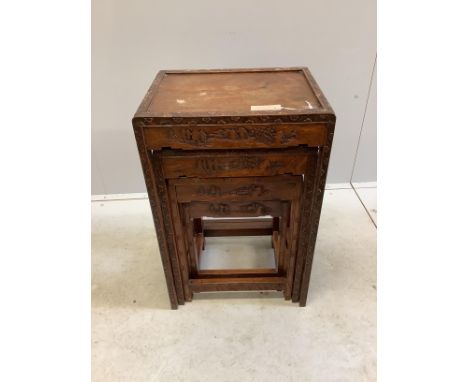 A Chinese carved wood quartetto of rectangular tea tables, width 46cm, depth 35cm, height 69cm Several large chips and splits