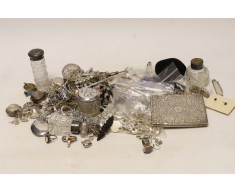 A group of assorted silver and jewellery, including a 19th century snuff box, sifter spoon and card case, a later toilet jar,